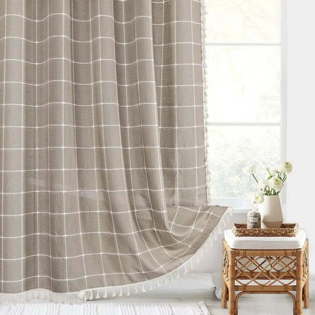 Linova linen shower curtain with boho tassel design in a farmhouse bathroom