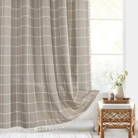 Linova linen shower curtain with boho tassel design in a farmhouse bathroom